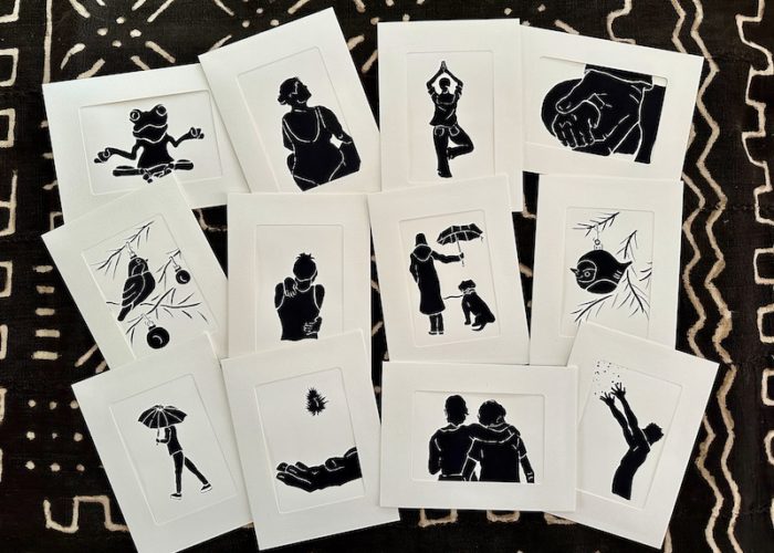 Twelve ink silhouettes in 5 x 7 inch mats